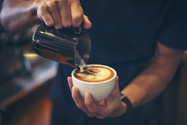 close-up-hands-barista-make-latte-coffee-art-paint-1-1.jpg